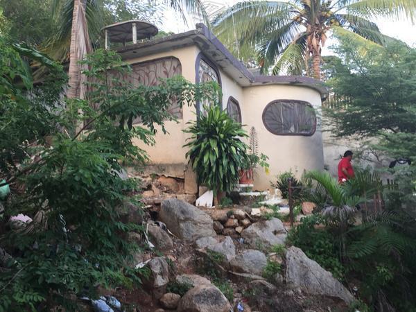 Terreno con casa en obra