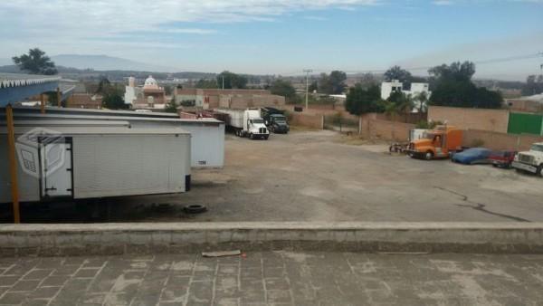 Terreno a pie de carretera en la punta, tonala