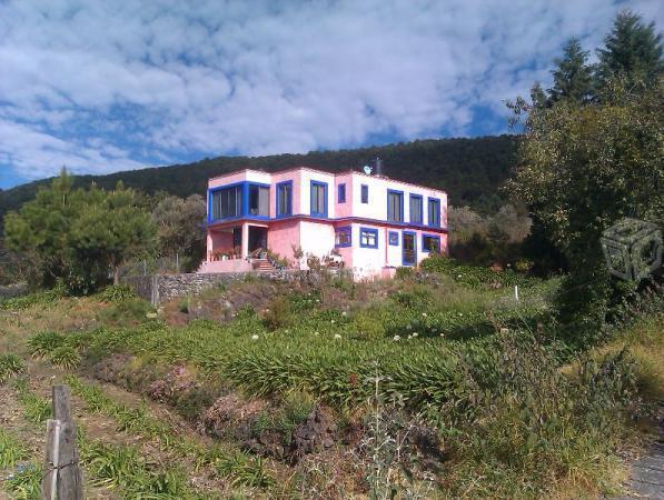 CASA Y TERRENO CON VISTA a PIE DE CARRETERA