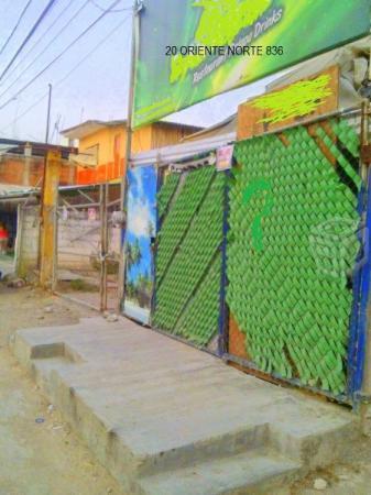 Palapa con estacionamiento a la vuelta del estadio