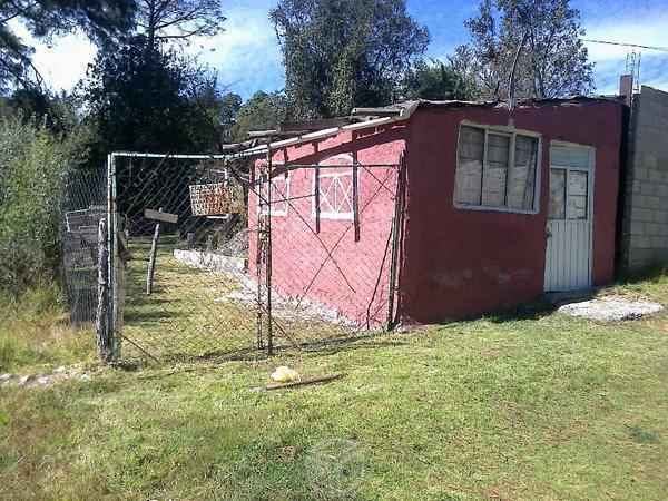 Venta de terreno con cabaña