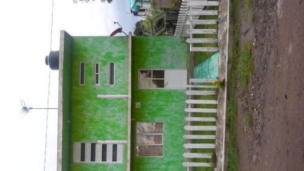 Casa de 2 niveles color verde