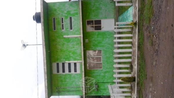 Casa de 2 niveles color verde